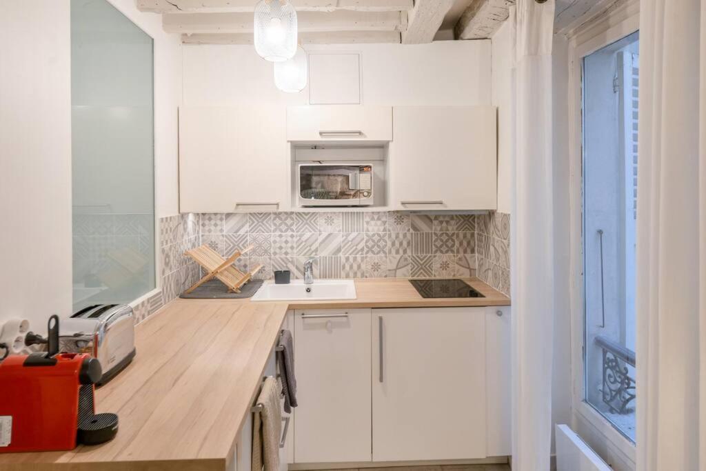 Cosy Appartement En Plein Marais Paris Bagian luar foto