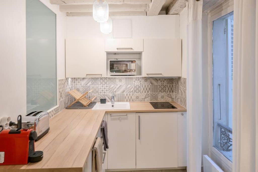 Cosy Appartement En Plein Marais Paris Bagian luar foto